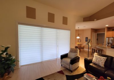 Roller shade and shutters for living hall